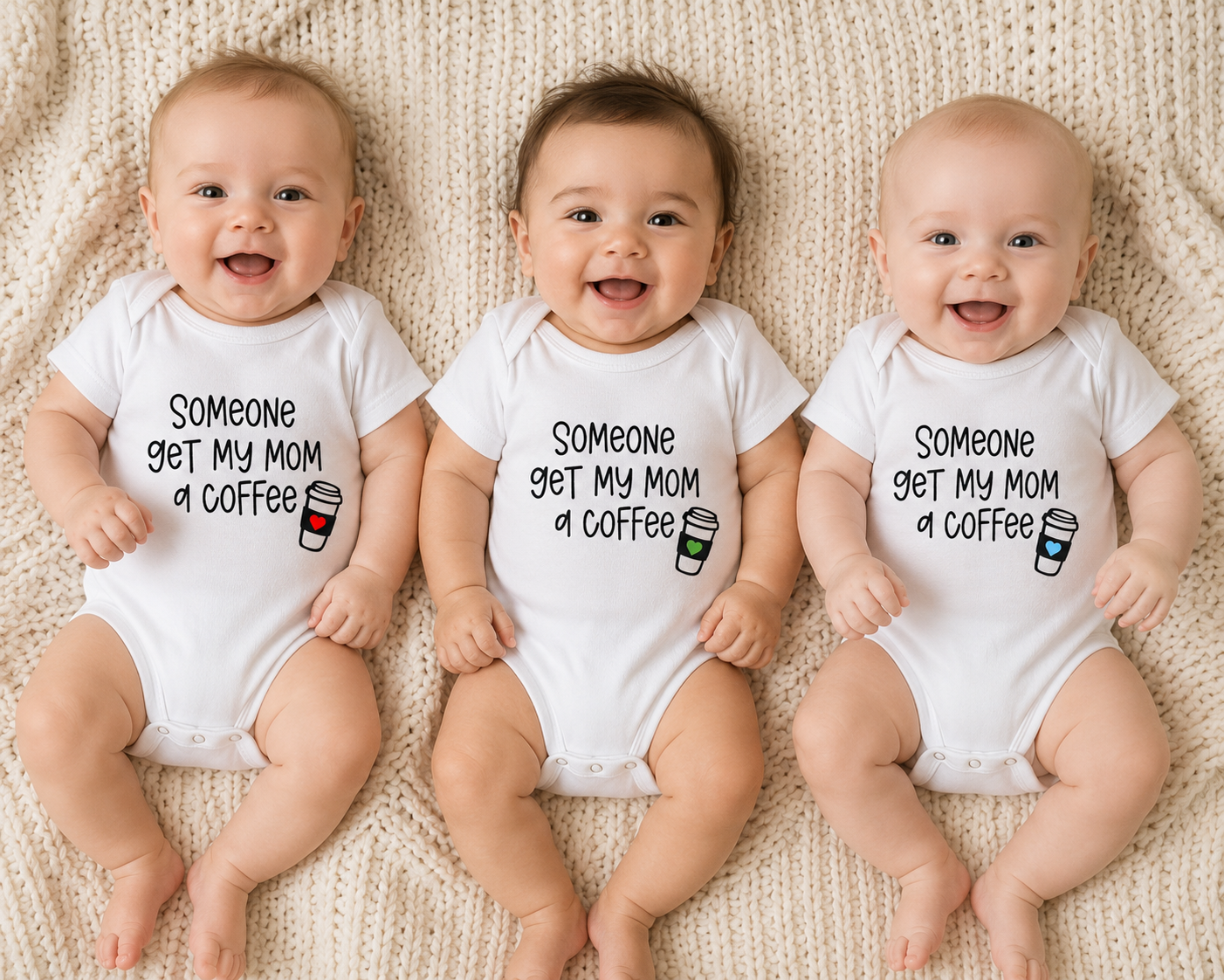 Three babies wearing white onesies with someone get my mom a coffee.